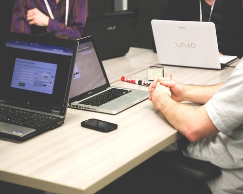 Creative team discussing in a well-lit modern office space